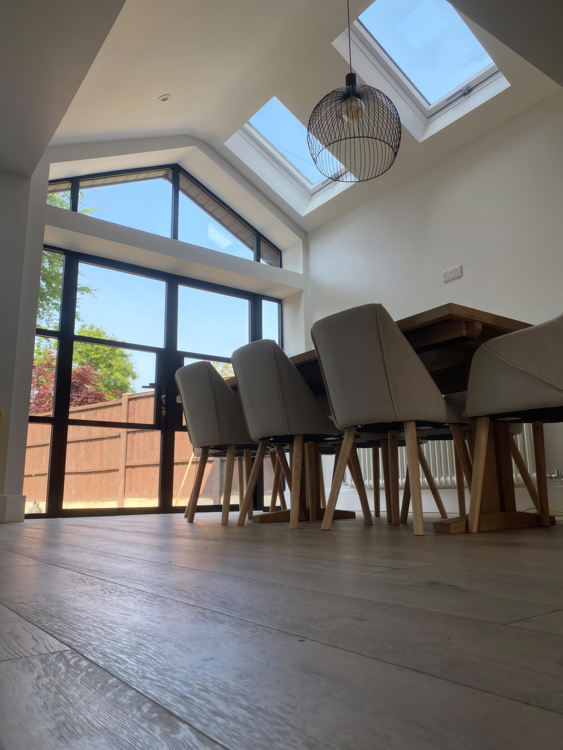 Vaulted gable dining extension with Crittall style glazed doors in Liverpool