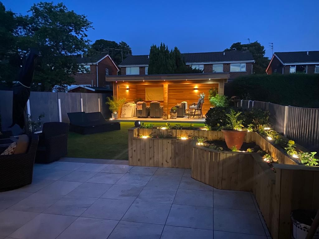 Insulated western red cedar garden room and porcelain patio