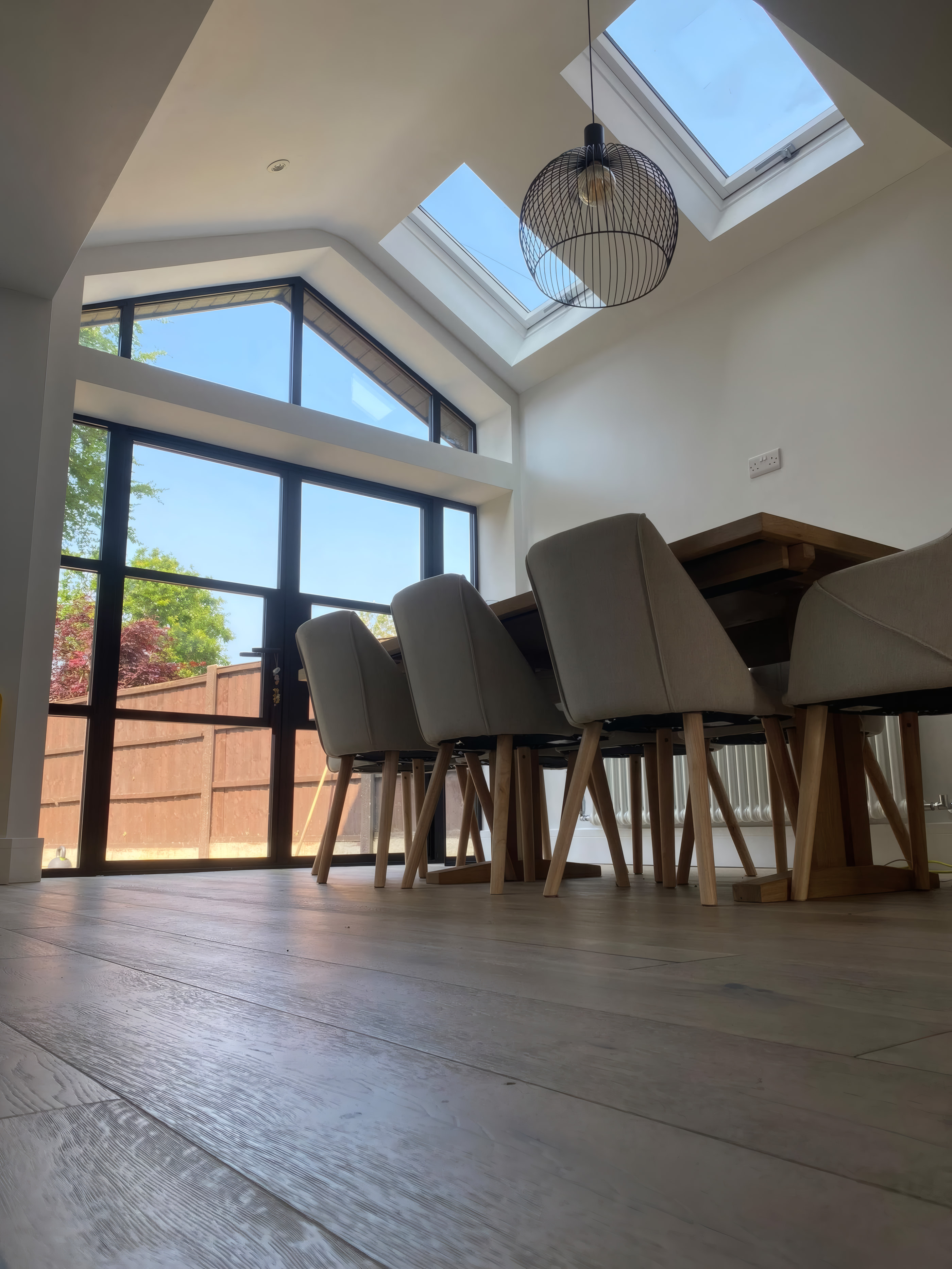 Vaulted gable dining extension with Crittall style glazed doors in Liverpool
